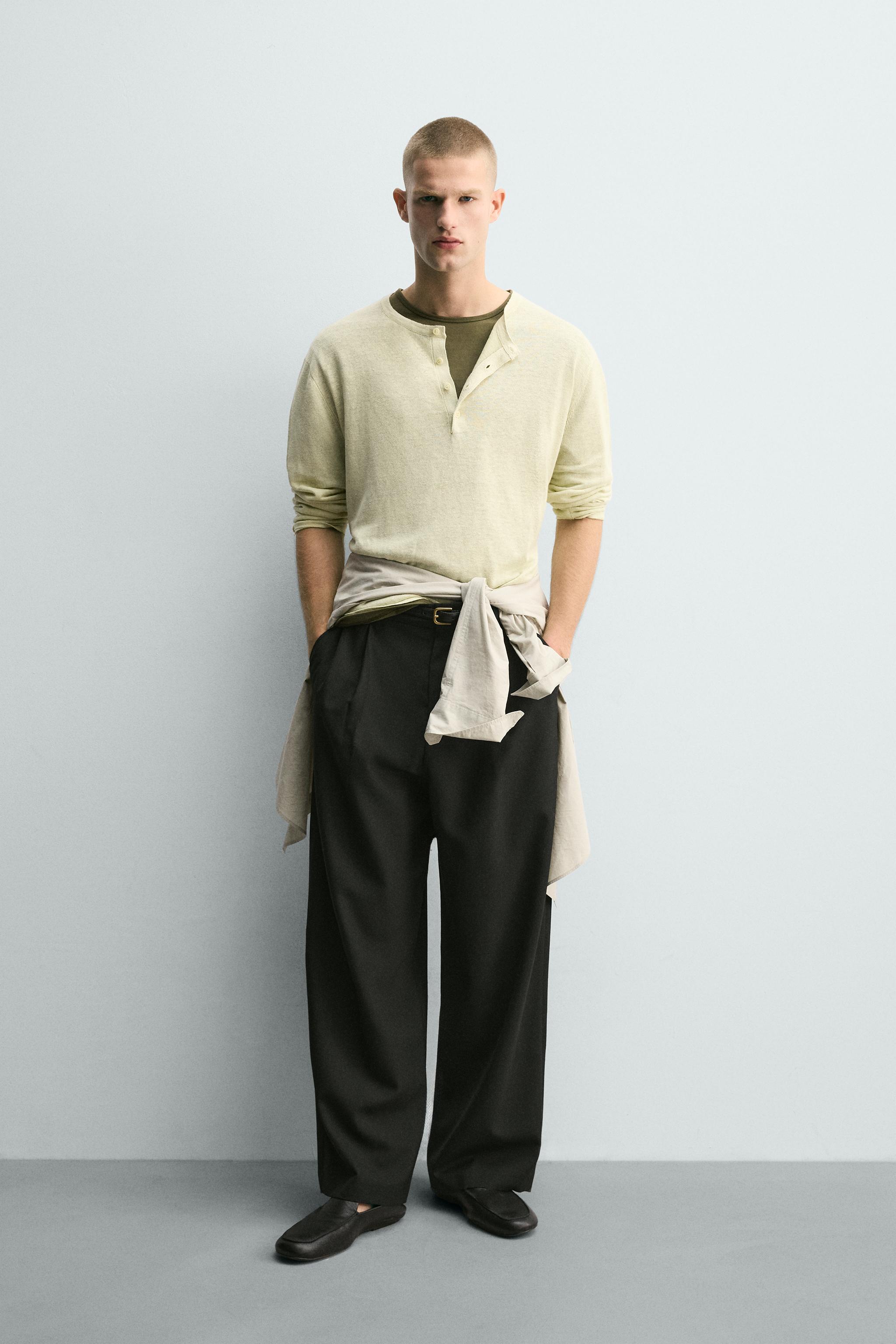 PANTALON RELAXED FIT À PLIS